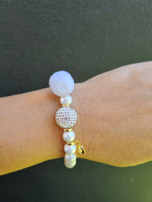 white pearl bracelet with swarovski and pom pom