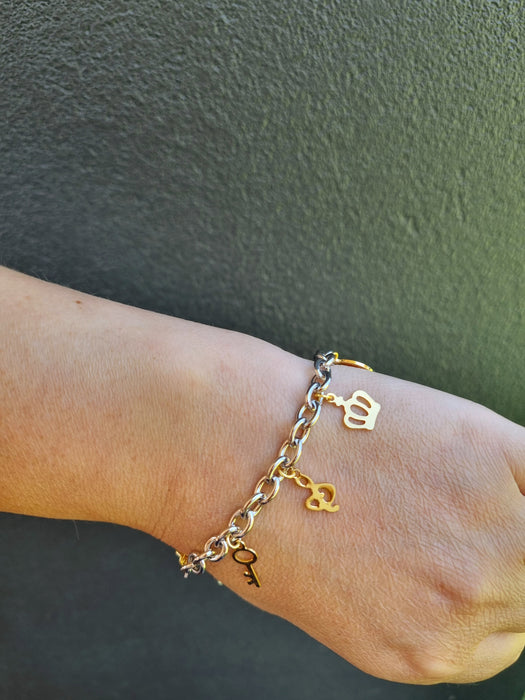 girl wearing silver charm bracelet