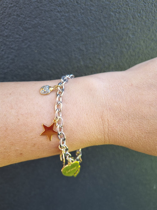 girl wearing bracelet with charms