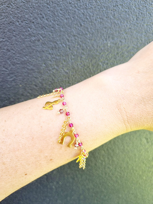 girl wearing charm bracelet