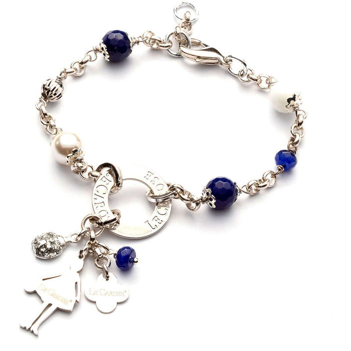 silver charm bracelet with navy blue jewels and stones. 