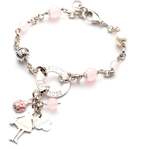 Silver bracelet with pink jewels and ladybug charm