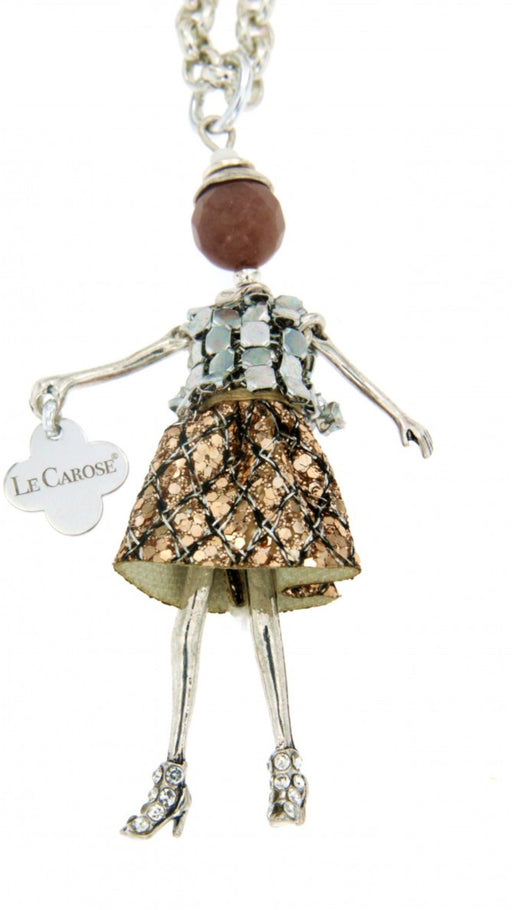 long silver chain necklace with doll pendant.The doll features a brown metallic skirt, metal top and rhinestone shoes